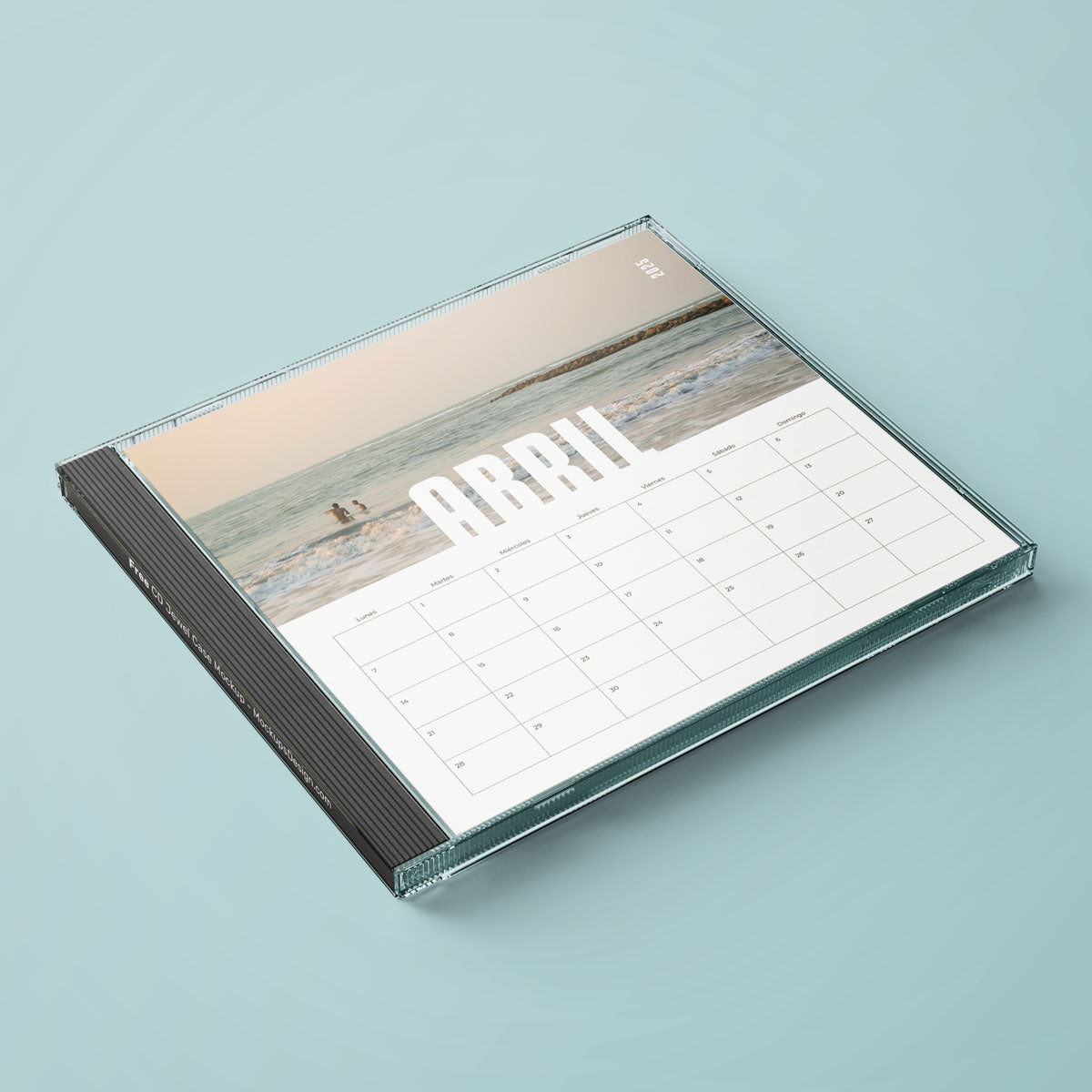 Calendario de CD con foto de playa.