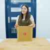 Unboxing de fotolibro Ryl, caja, sobre y envoltura de regalo.