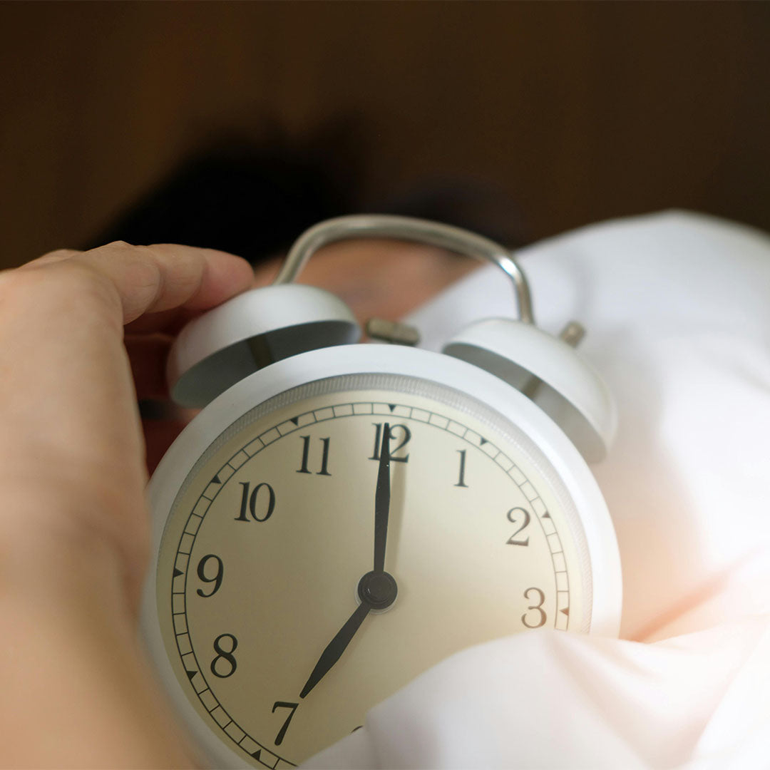 Reloj despertador de manecillas.